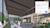 Building facade with multiple glass doors and windows overlayed with SketchUp collaboration features toolbar