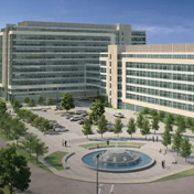 Un render 3D de Quarry Rise modelado en SketchUp y renderizado en 3ds Max, con edificios modernos de oficinas de cristal, una fuente circular y aparcamiento.