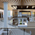 Modèle SketchUp de l'intérieur d'un espace commercial montrant une vue du premier et du deuxième étage reliés par un escalier et des personnages à l'échelle circulant dans cet espace.