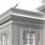 Close up on a hand sketch style model of a building exterior with a red pencil icon hovering over the model.