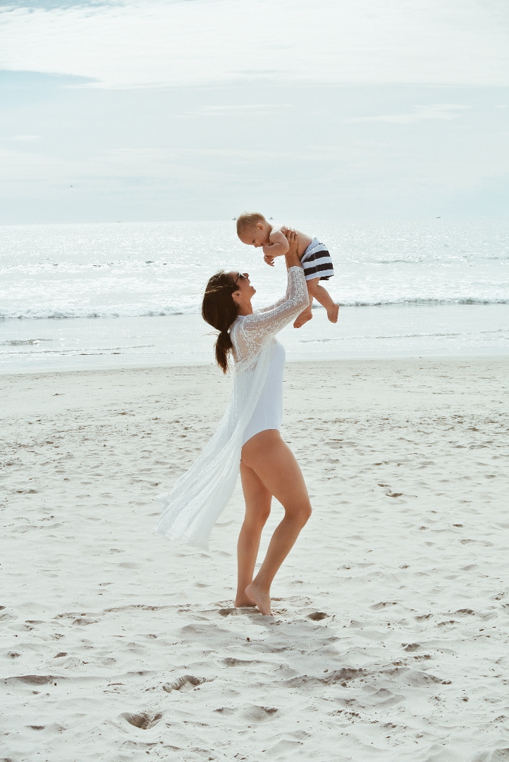 Swimsuits-all white one piece swimsuit full coverage white lace long sleeve long swim cover large floppy straw hat beach outfit pool look mother son photos mother newborn photos beach family photos mother baby photos hotel del