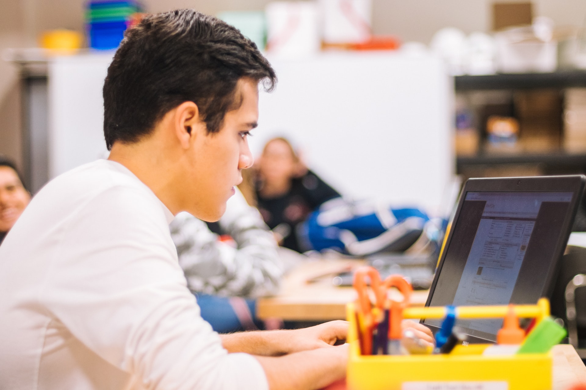 Student using NoRedInk to practice writing on a laptop