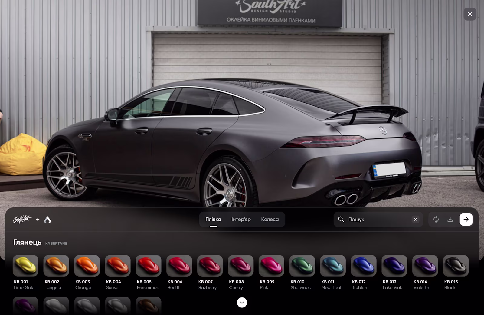 A Mercedes-AMG GT outside the SouthArt studio with the wrap film palette below