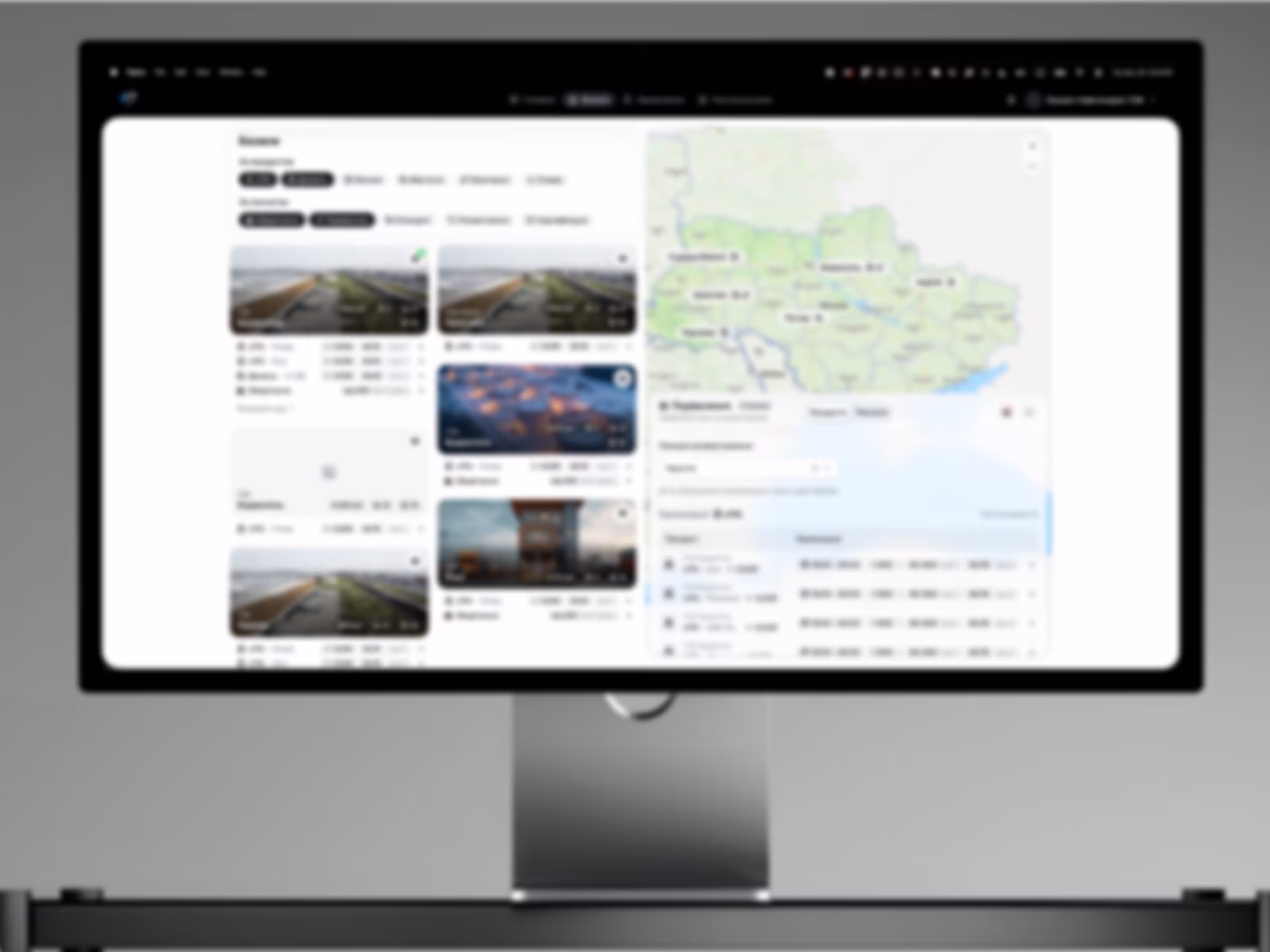 GT listings dashboard with a map panel on a desktop monitor (blurred for NDA).