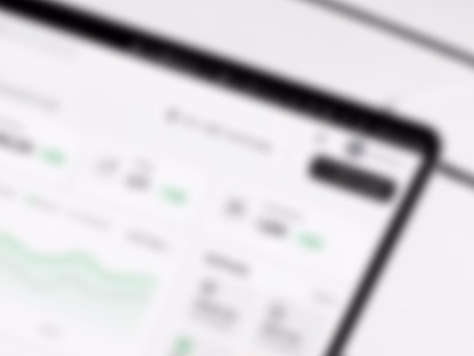 The Ads analytics dashboard on a tablet, blurred for confidentiality