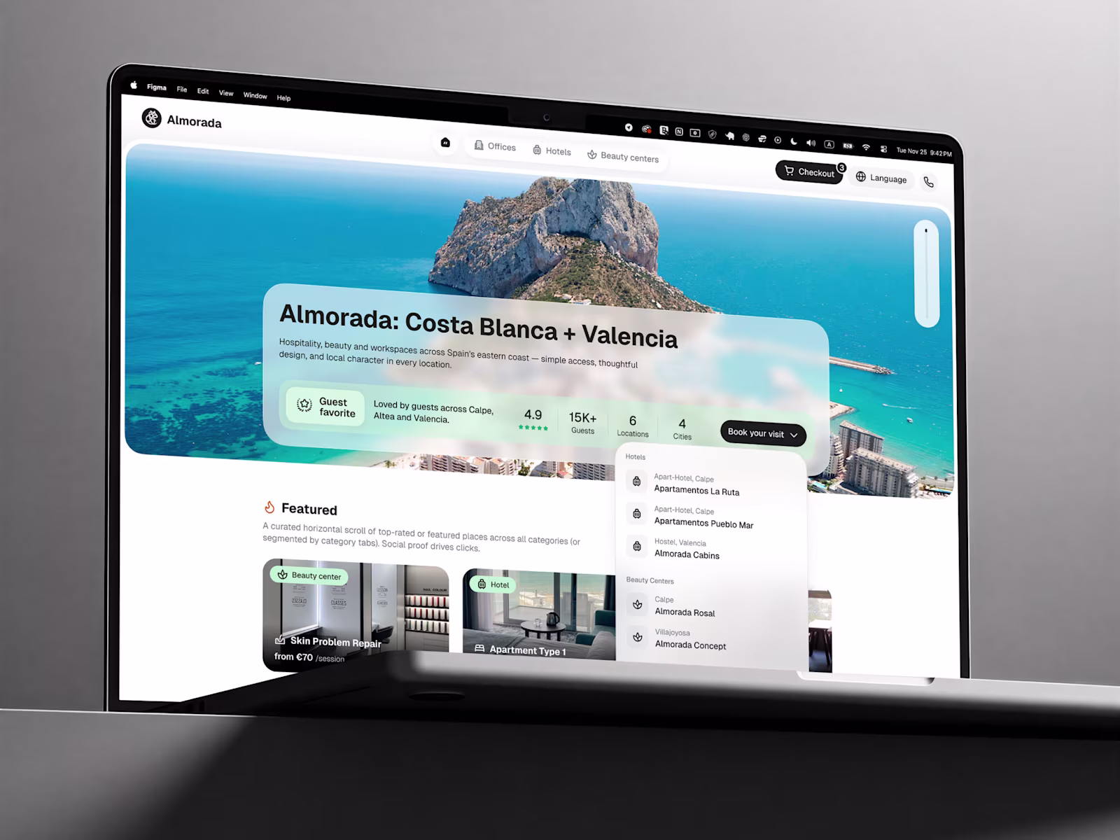Almorada Costa Blanca and Valencia landing page with apartment search on a laptop.