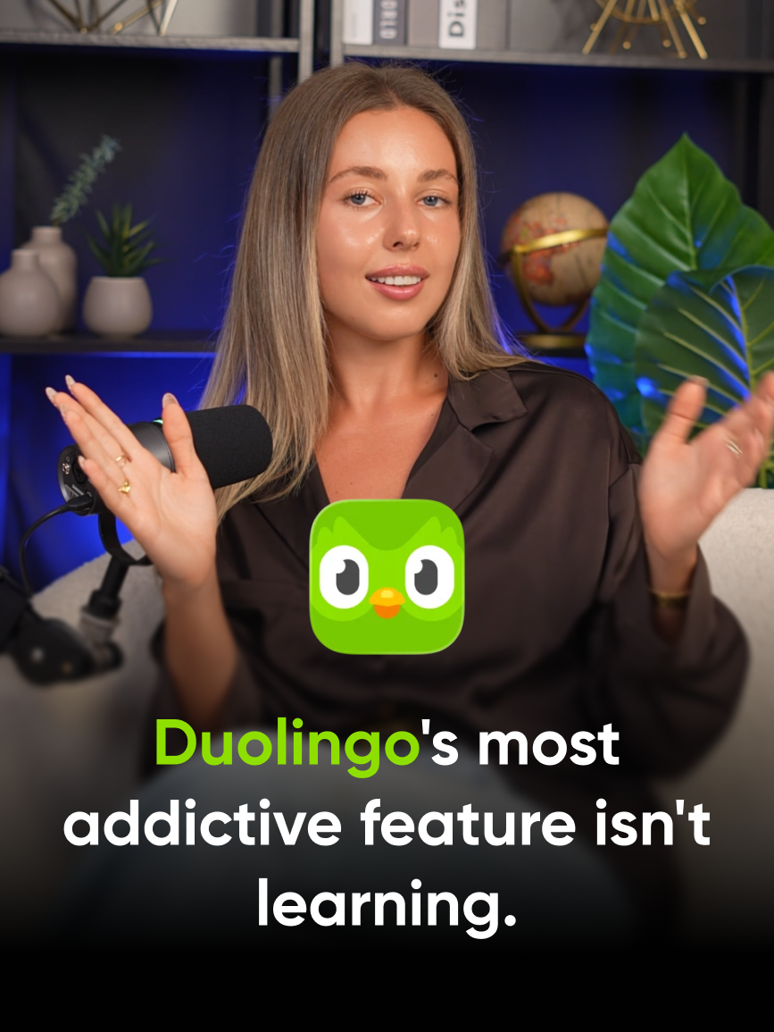 Valeria from Reliqio at a podcast microphone beside the Duolingo owl, with the title "Duolingo's most addictive feature isn't learning."