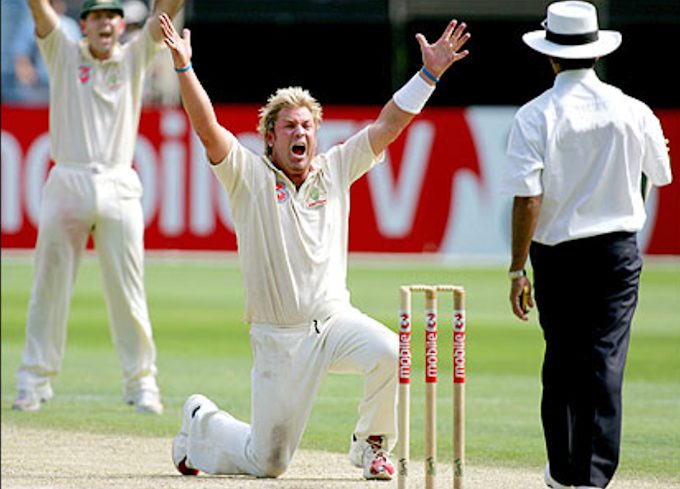A bowler appealing for LBW with arms outstretched