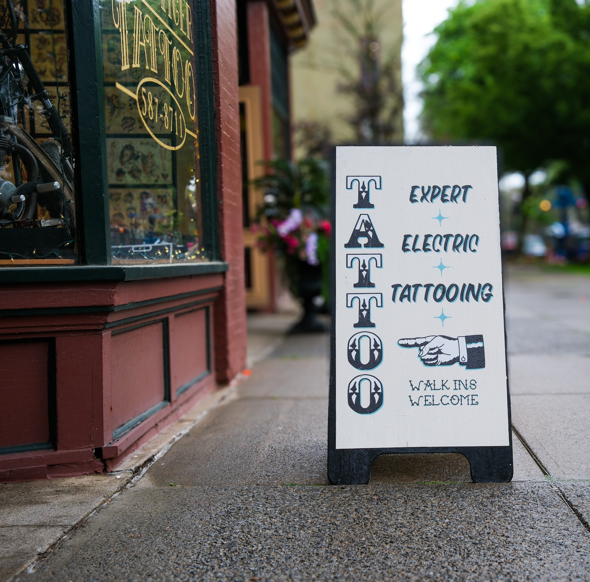 a tatto parlor sign