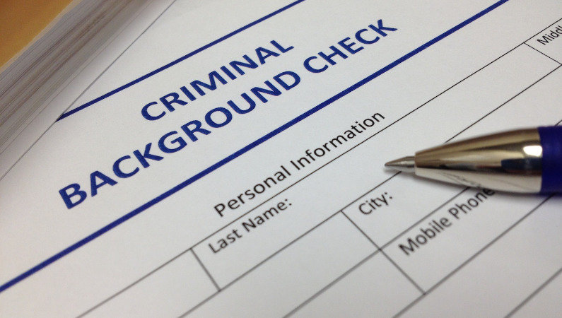 Photo of a background check application form