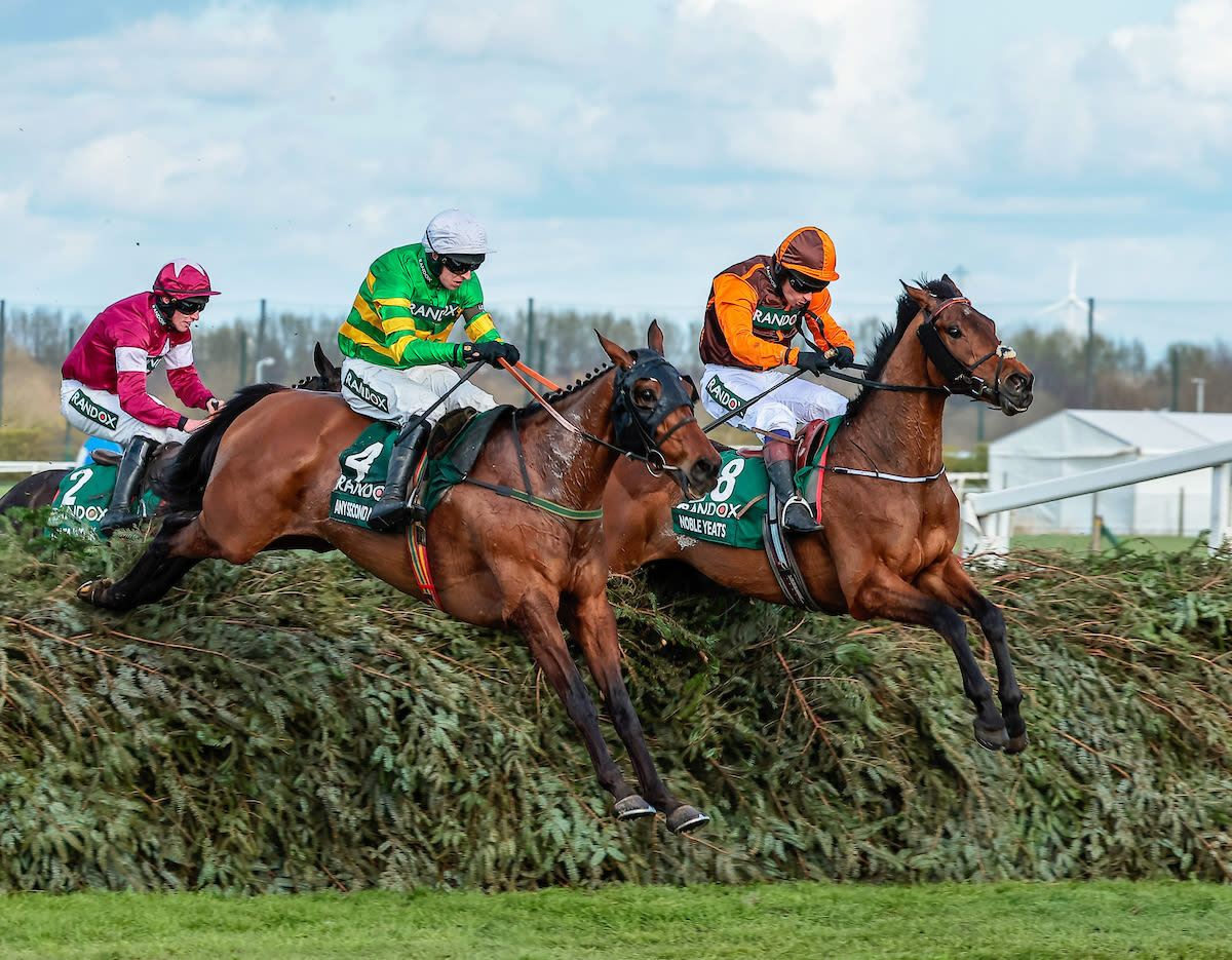  Noble Yeats, right, jumps the last with Any Second Now in a thrilling Randox Grand National (focusonracing.com)