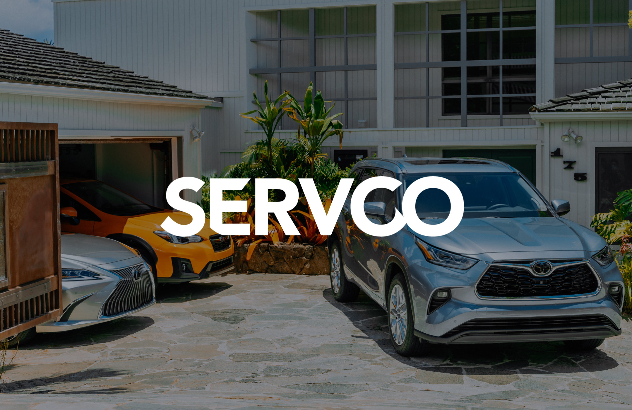 Servco logo overlaid on top top of an image of a car
