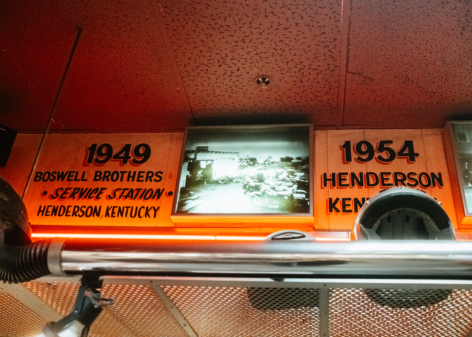 Vintage hand-painted signage on display in the Boswell’s Harley-Davidson dealership showroom.