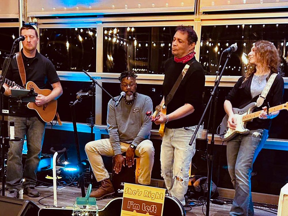 four musicians playing