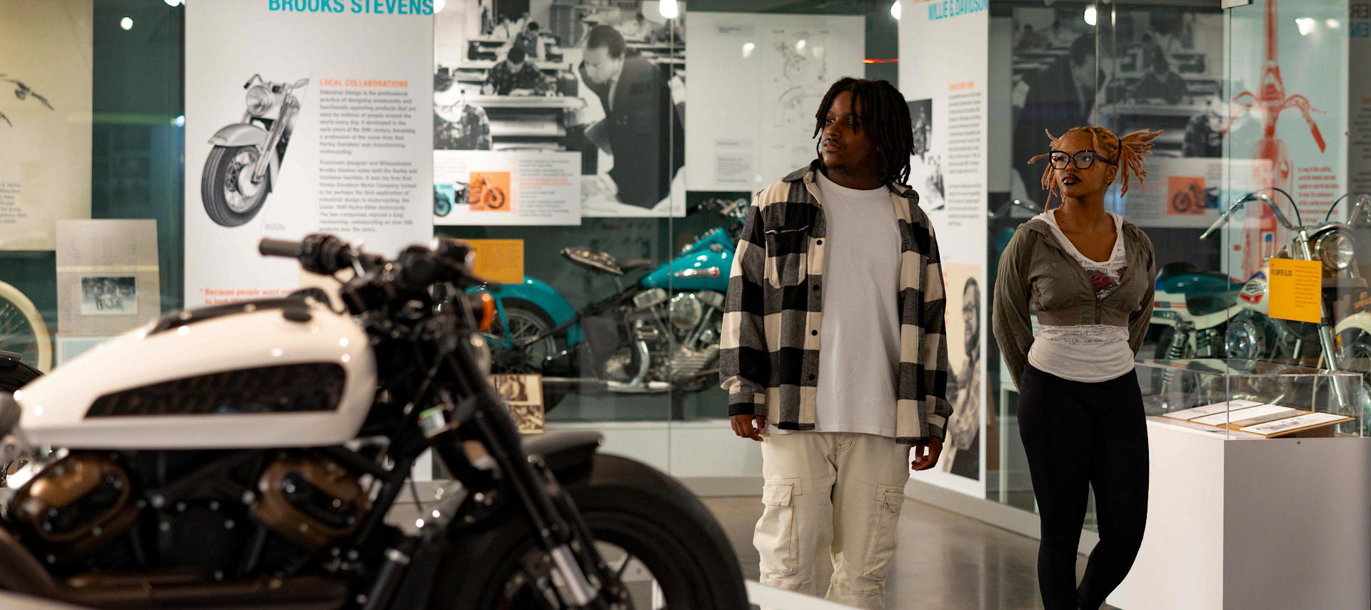 3.1.3_DesignLabExhibit_HeroWithMediaCard_CreatingALegend