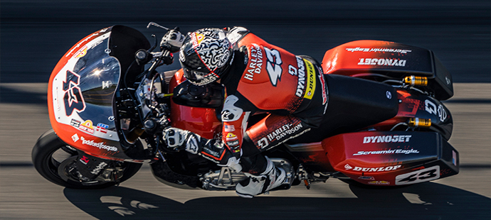James Rispoli on his motorcycle on the high banks of Daytona