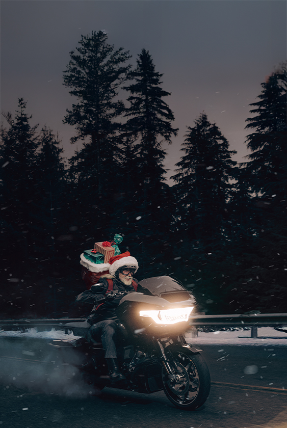 Santa riding a 2025 Road Glide
