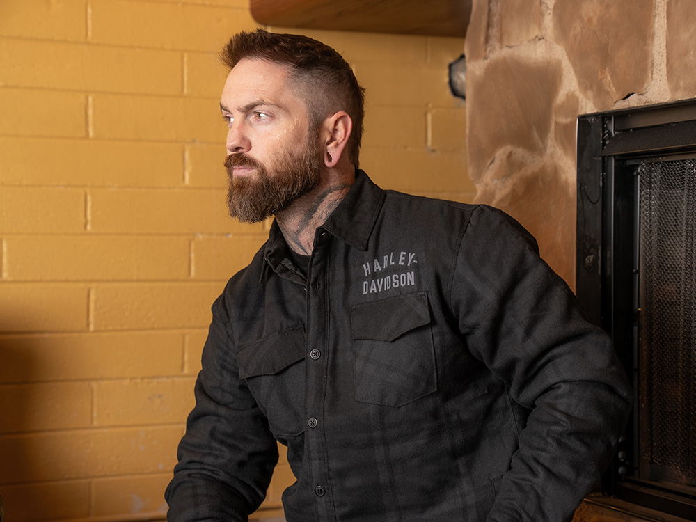 Man in long-sleeve flannel shirt