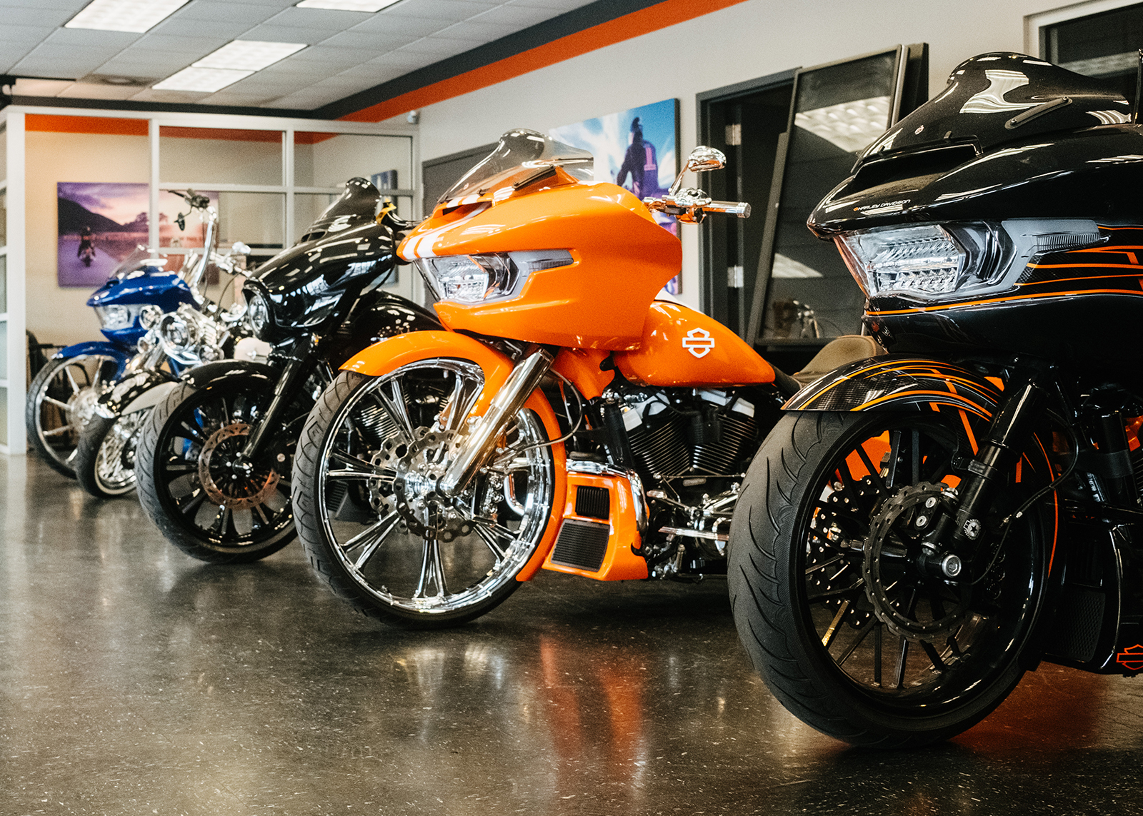 A row of custom Harleys parked in the Nash customs space at Boswell’s Harley-Davidson dealership.