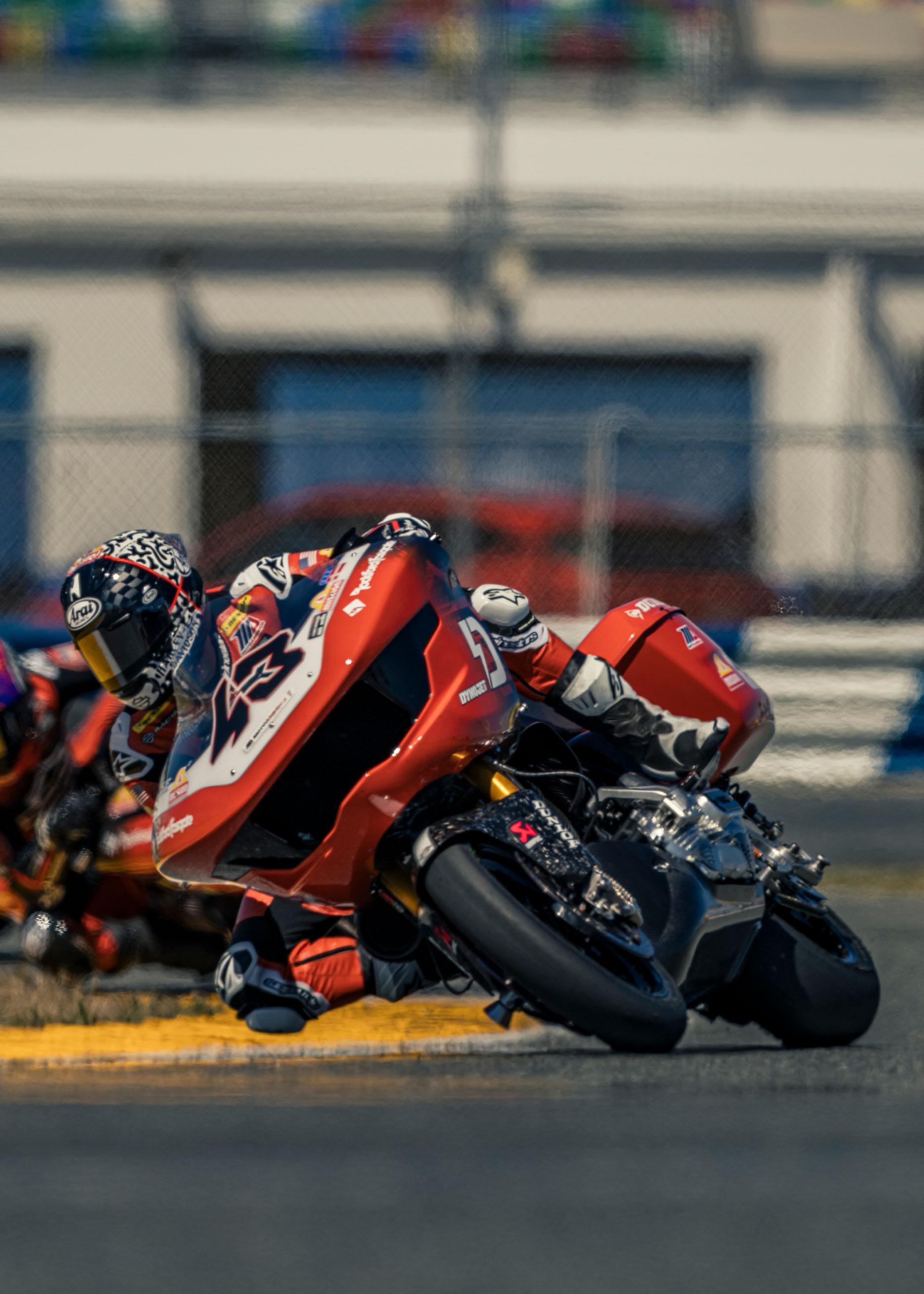 James Rispoli navigates a corner on his number forty-three motorcycle at Daytona International Speedway
