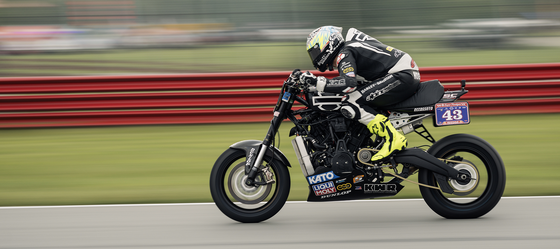 James Rispoli tucks low on his #43 Harley-Davidson during a high-speed section of the racetrack.