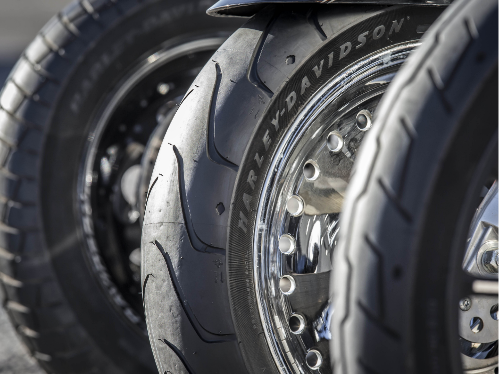 Close-up of Harley-Davidson motorcycle tires and wheels