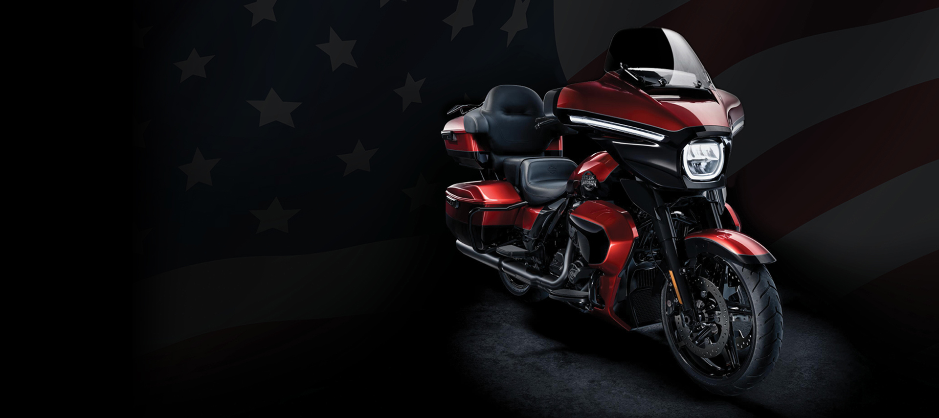 Street Glide Ultra Motorcycle on black background with American Flag