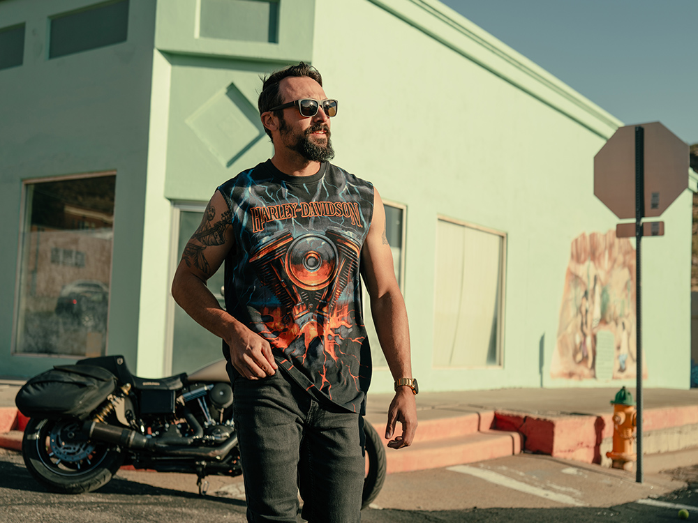 Man in cutoff t-shirt with v-twin engine graphic