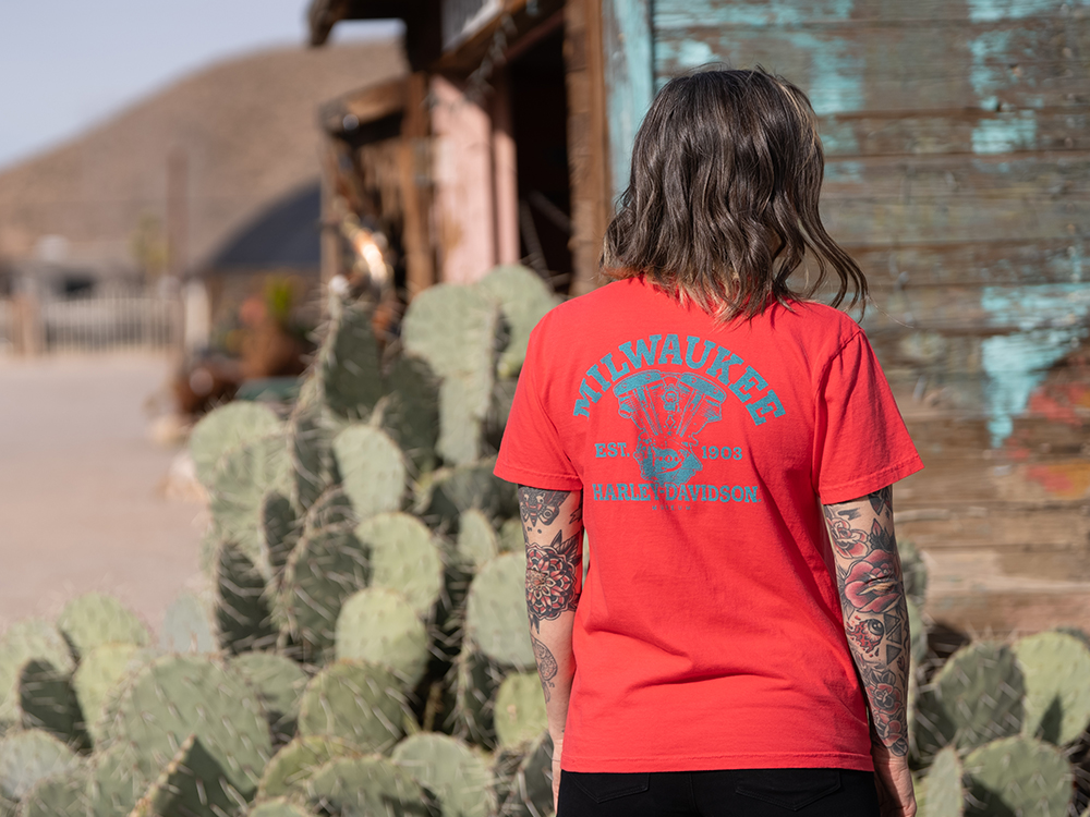 woman wearing a red tee