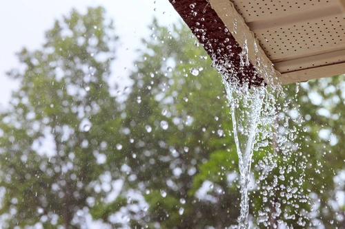 during-heavy-rain-water-comes-from-the-over-gutte-2023-11-27-05-25-06-utc-2