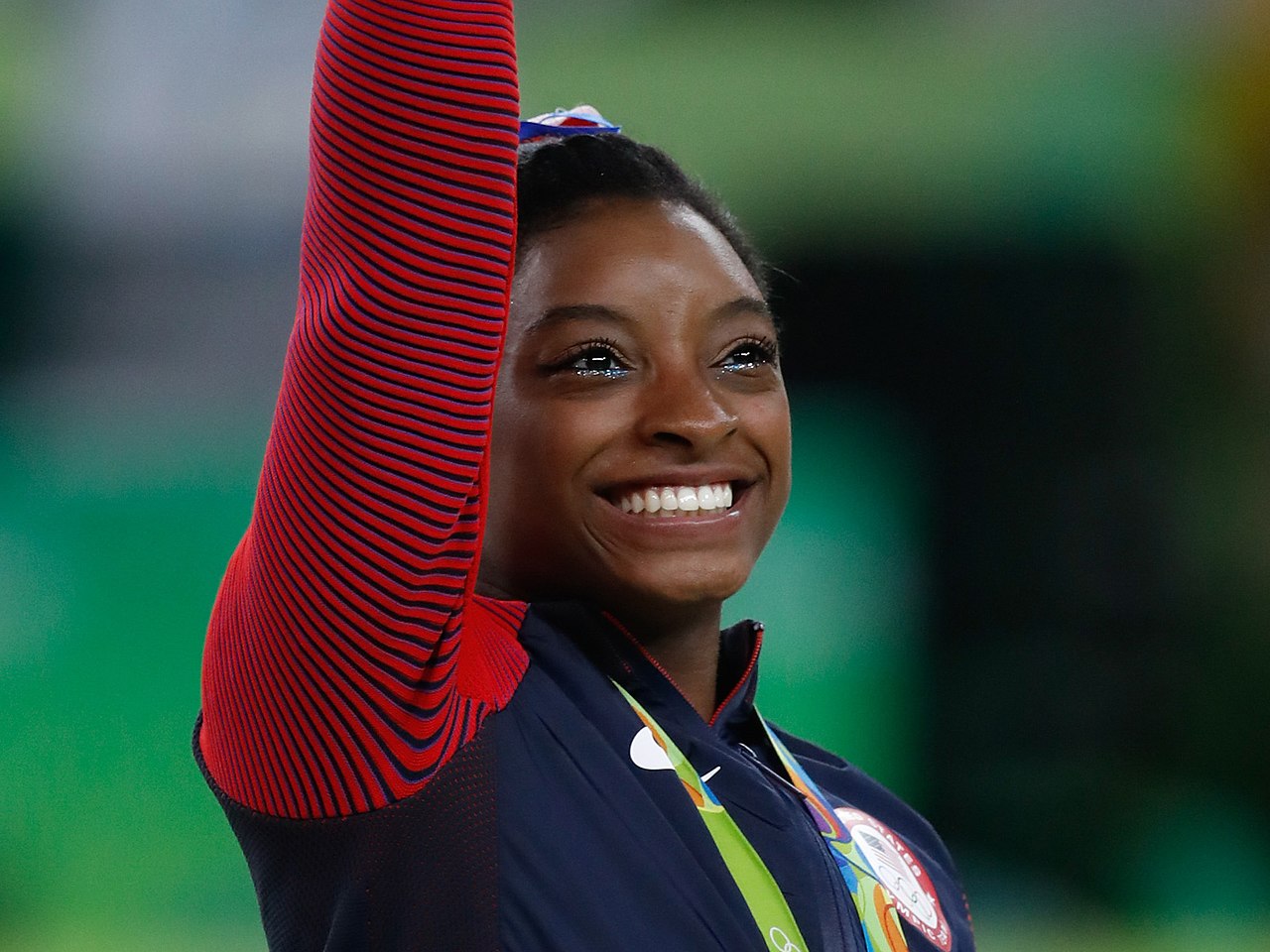Photo de Simone Biles, gymnaste olympique. 