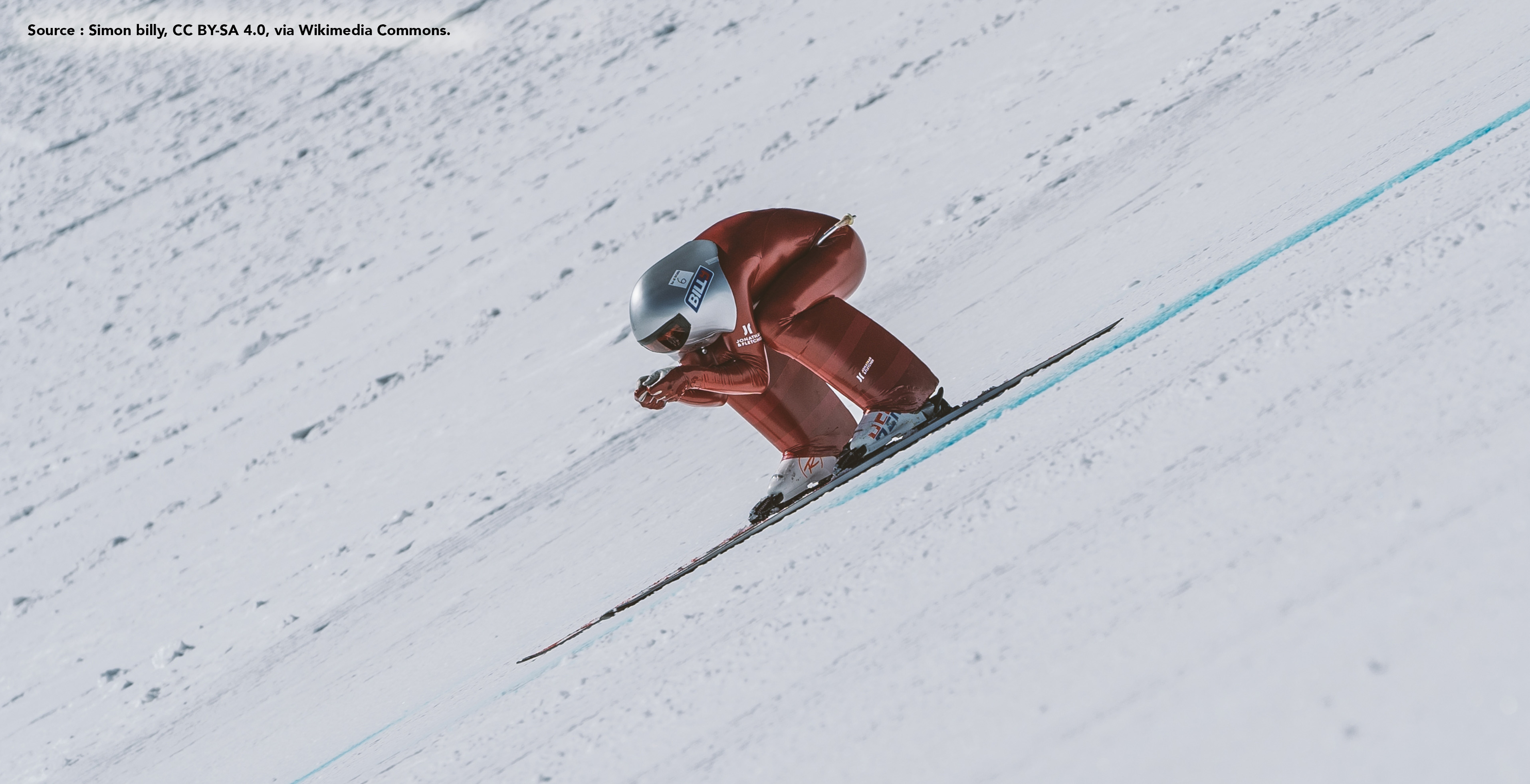 Photo d’une personne qui fait du ski alpin à toute vitesse.  