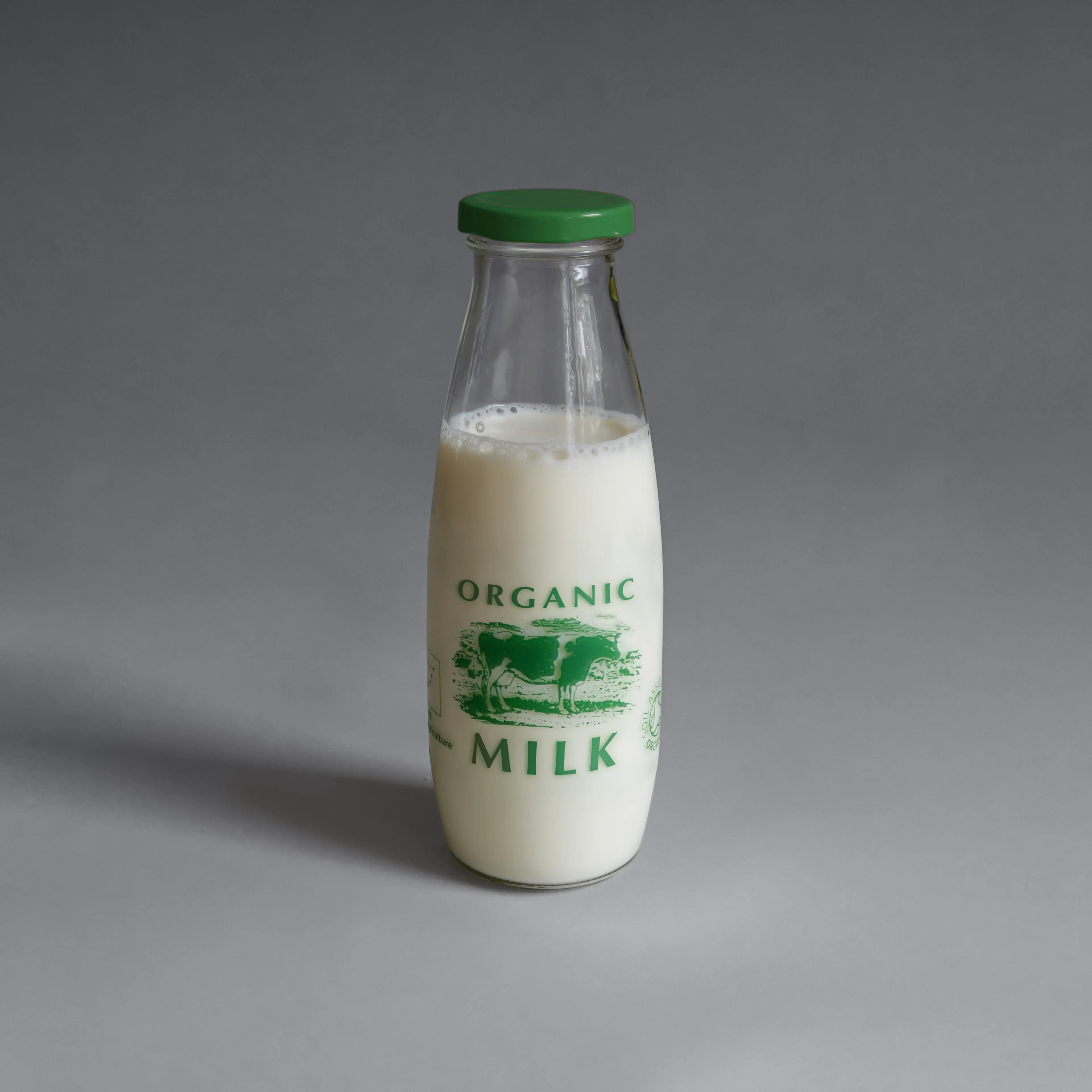 Organic milk in glass bottle
