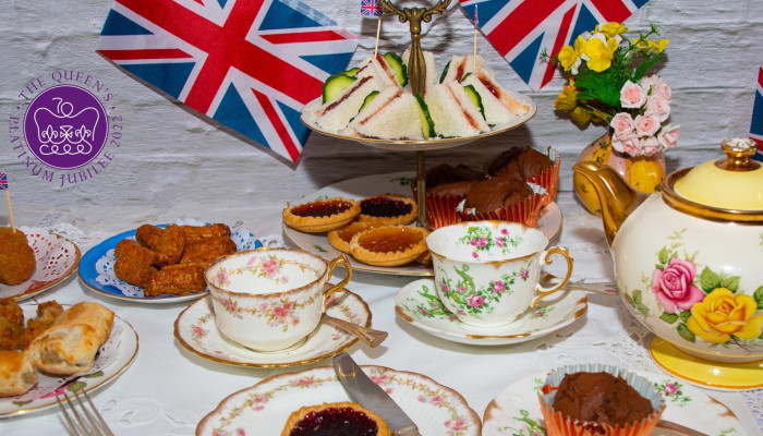 Cream tea on the table with bunting