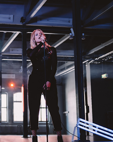 Alma Bjellerup in the recording of the music video " Lie Some More".