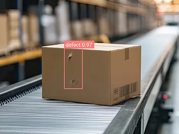 Defect Box For Computer Vision A damaged box on a conveyor belt in a warehouse being identified by ...