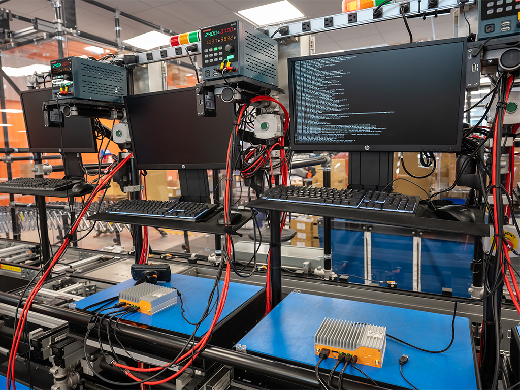 A computer screen showing the process of adding firmware to an ...