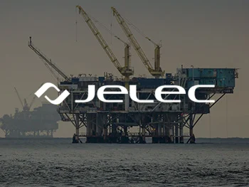A Jelec logo over a picture of an offshore oil rig.