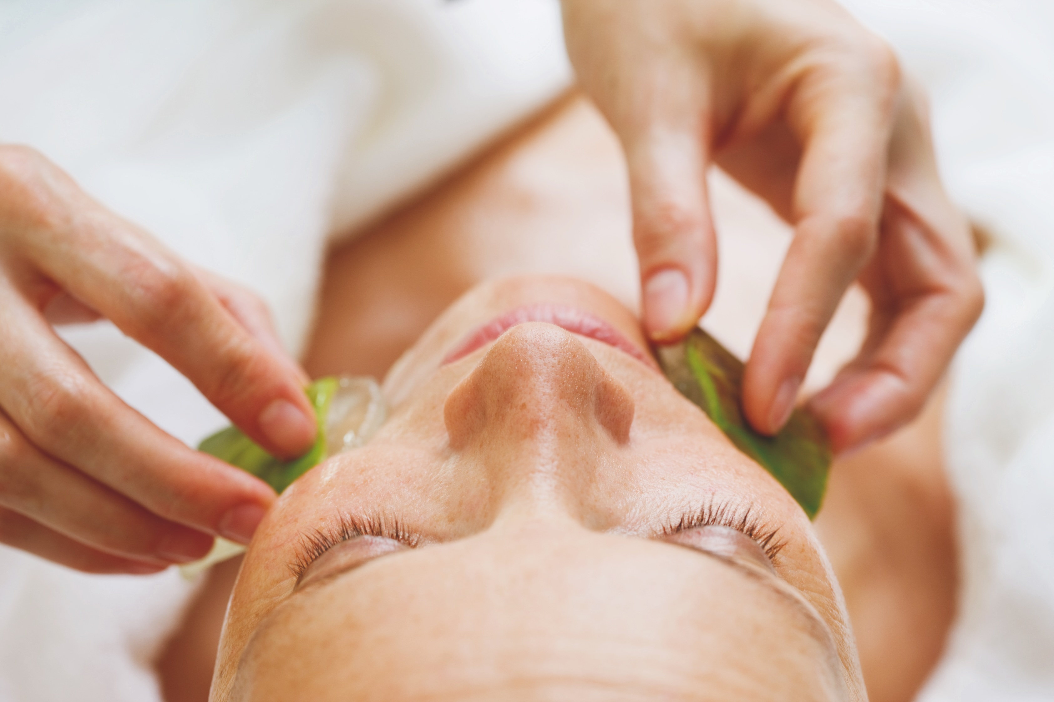 Woman getting a facial treatment