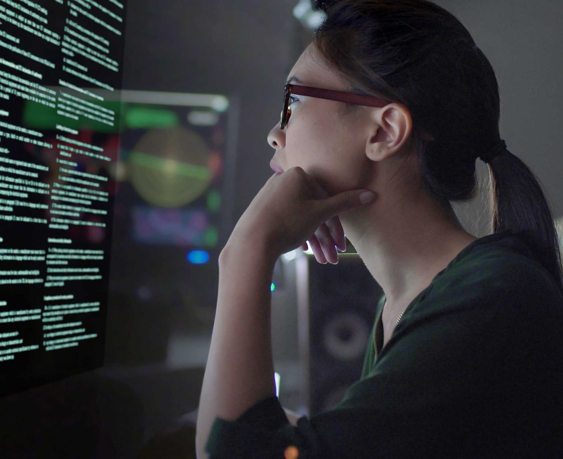 A young woman concentrating on auditing data | Hero