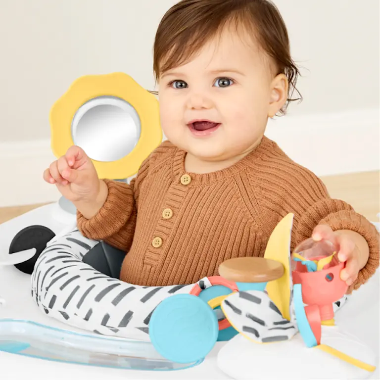 Baby in activity center