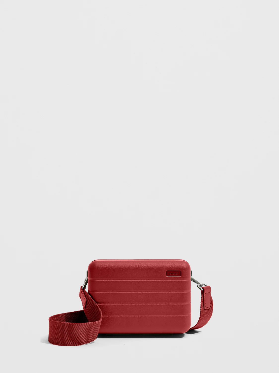 The Mini Crossbody in Tango Red with removable shoulder strap