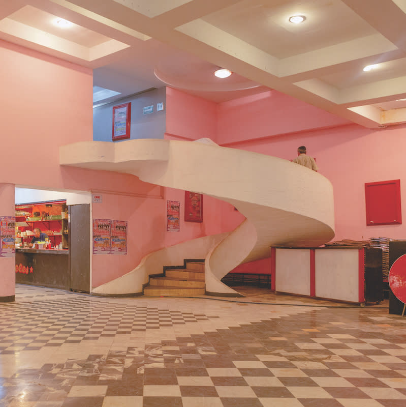 Salón Los Angeles, a cumbia dancehall in Mexico City, pink walls and a spiral white staircase.