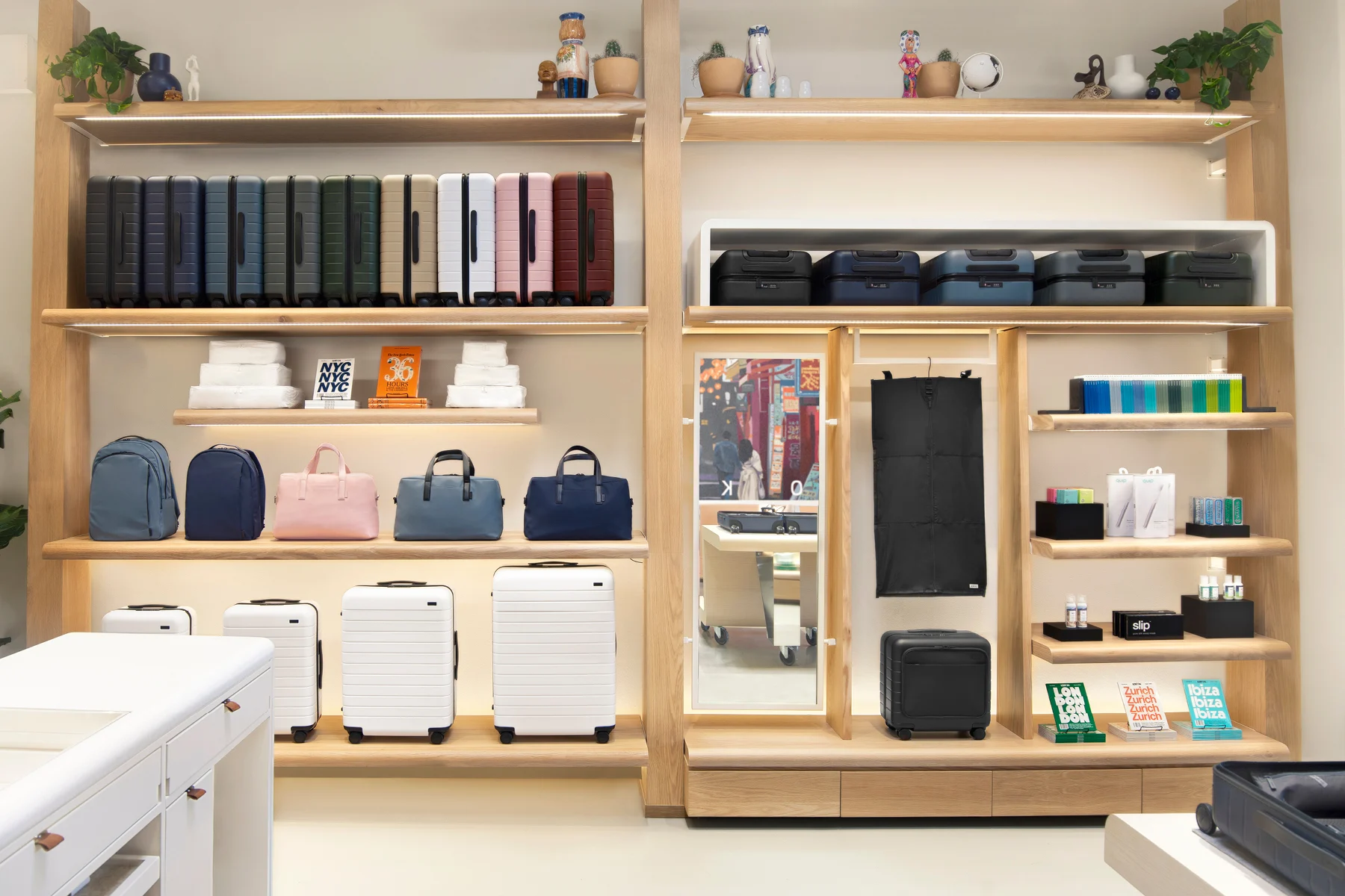 Suitcases and other travel products displayed in the Away store.