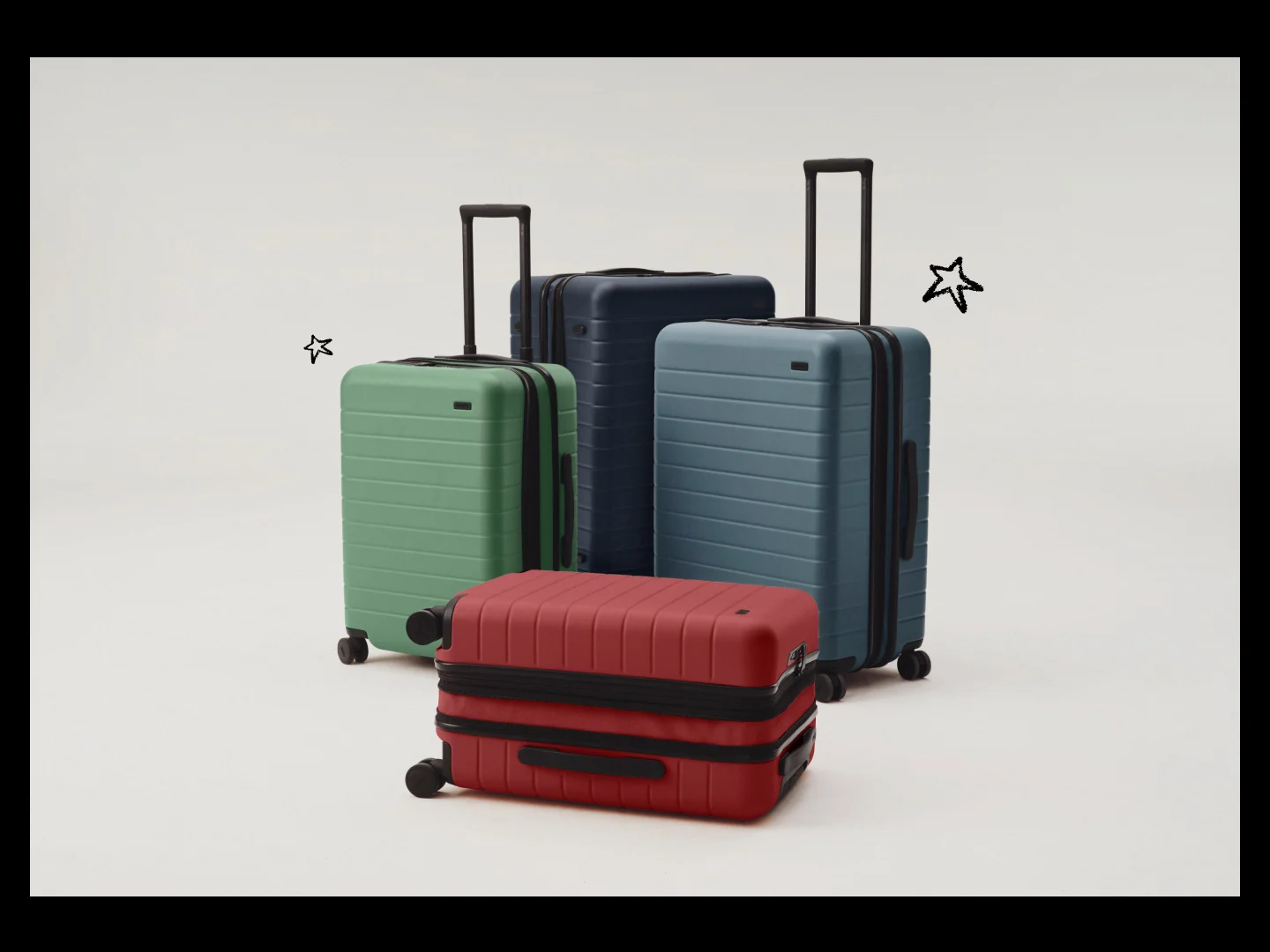 Away suitcases with expandable zippers in a variety of colors