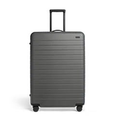 Asphalt checked-size suitcase