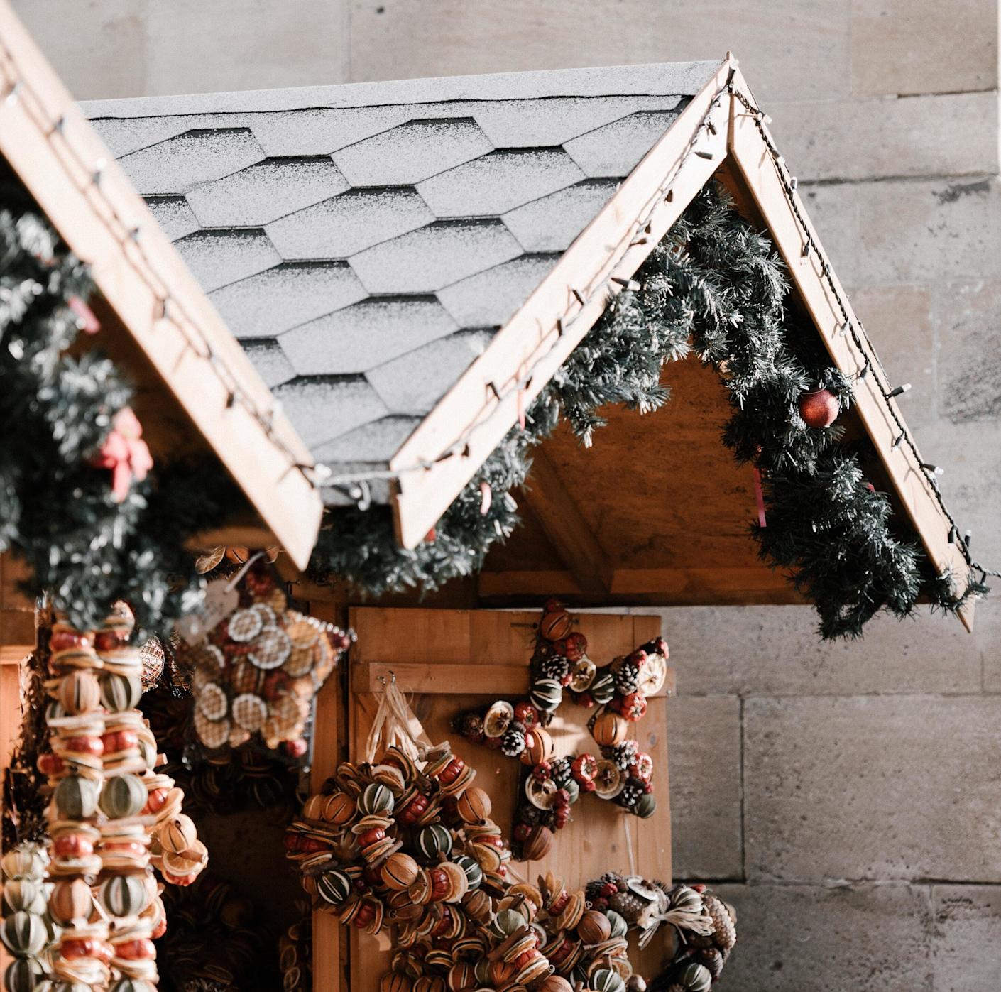 Souvenirs displayed in a close-up of a house-front in a Christmas market