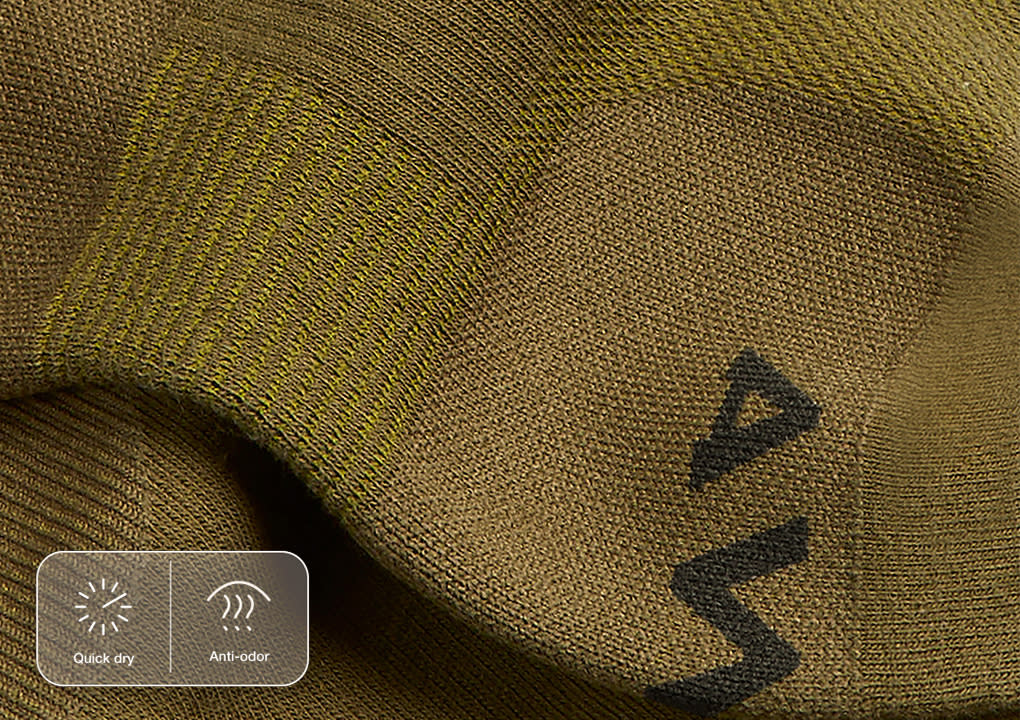 A close shot of the Away logo showing the 'A' and 'W' on travel compression socks.