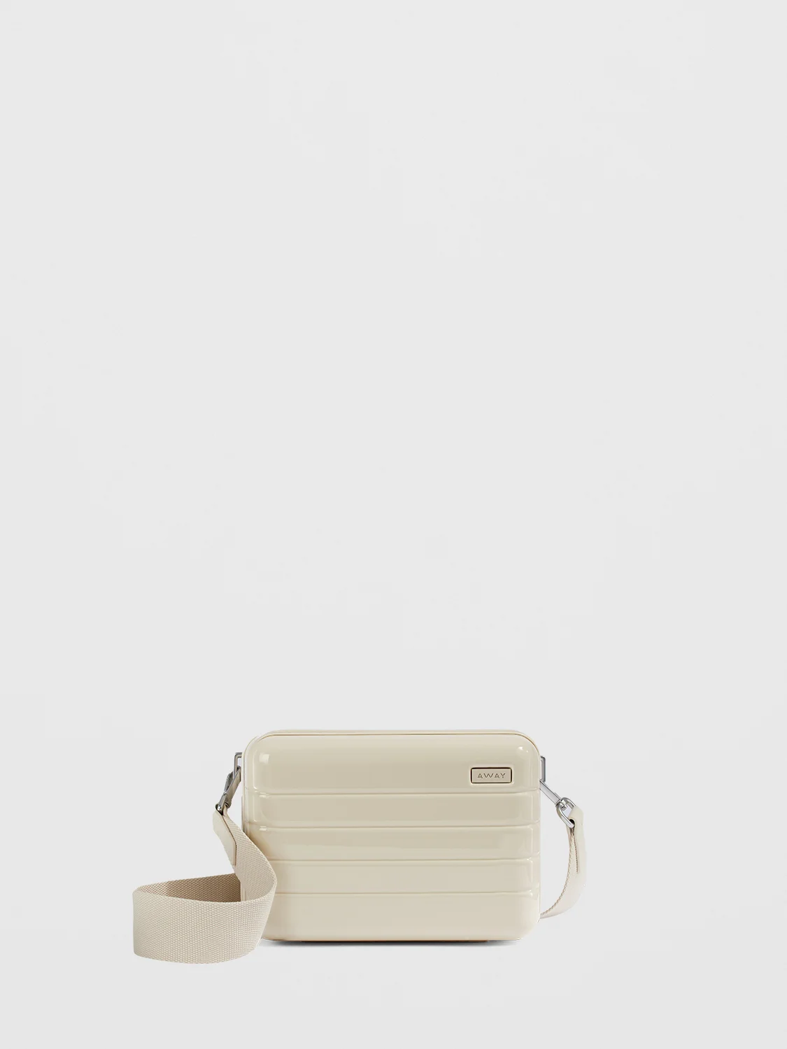 The Mini Crossbody bag from Away in glossy Salt White