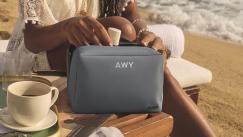 Closeup of the Away small toiletry bag in coast, monogramed